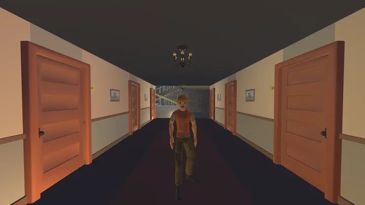 A porter in a hi-vis vest stands in the middle of an empty corridor, facing the camera.